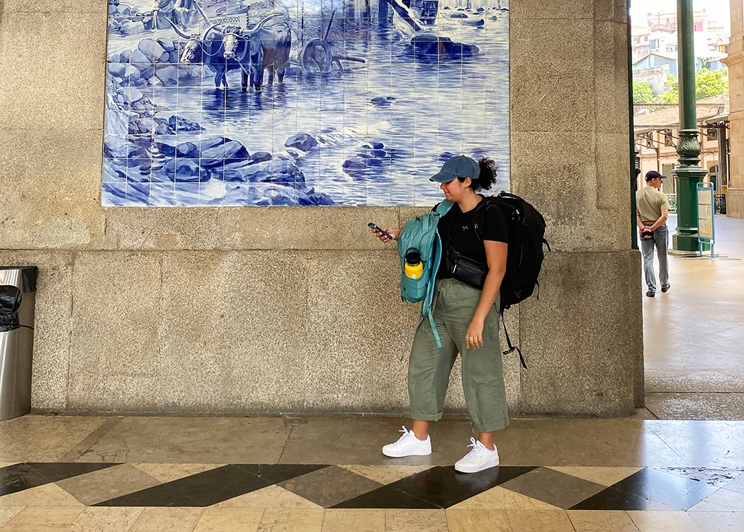 woman on phone in train station
